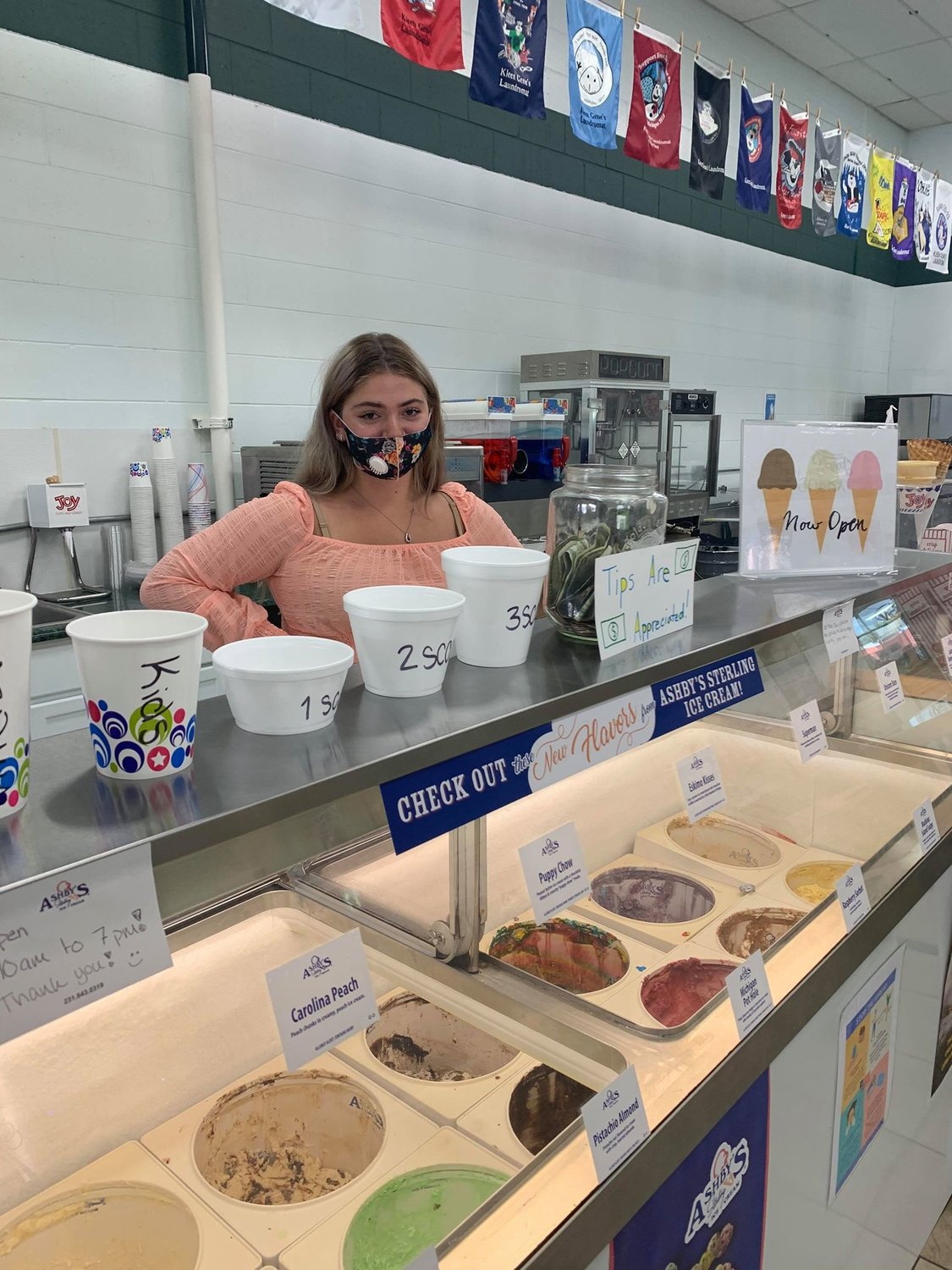 Young entrepreneur Arianna oversees the ice cream and snack bar at her family’s newly acquired business, Kleen Gene’s Laundromat in Harrison.